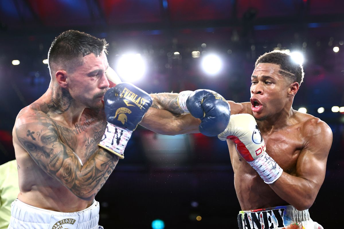 Devin Haney throws a right hand at George Kambosos during their lightweight title fight. 