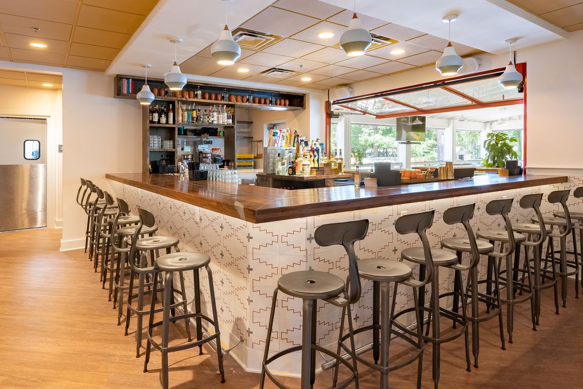 Wooden bar with steel stools. 