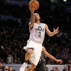 U.S. Team's Trey Burke, of the Utah Jazz, goes up for a basket against the World Team during the first half of the Rising Stars NBA All-Star Challenge basketball game, Friday, Feb. 13, 2015, in New York. (AP Photo/Julio Cortez)