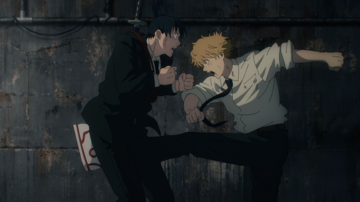 A blond haired anime boy in a dress shirt and black pants with a black tie and red and white sneakers kicks a black haired anime boy in an all black suit in the balls in a dark back alley.
