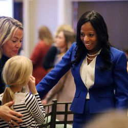 Rep. Mia Love, R-Utah, greets Darcy Van Orden and her daughter Christiana Belle Van Orden during an election night party in South Jordan on Tuesday, Nov. 8, 2016.