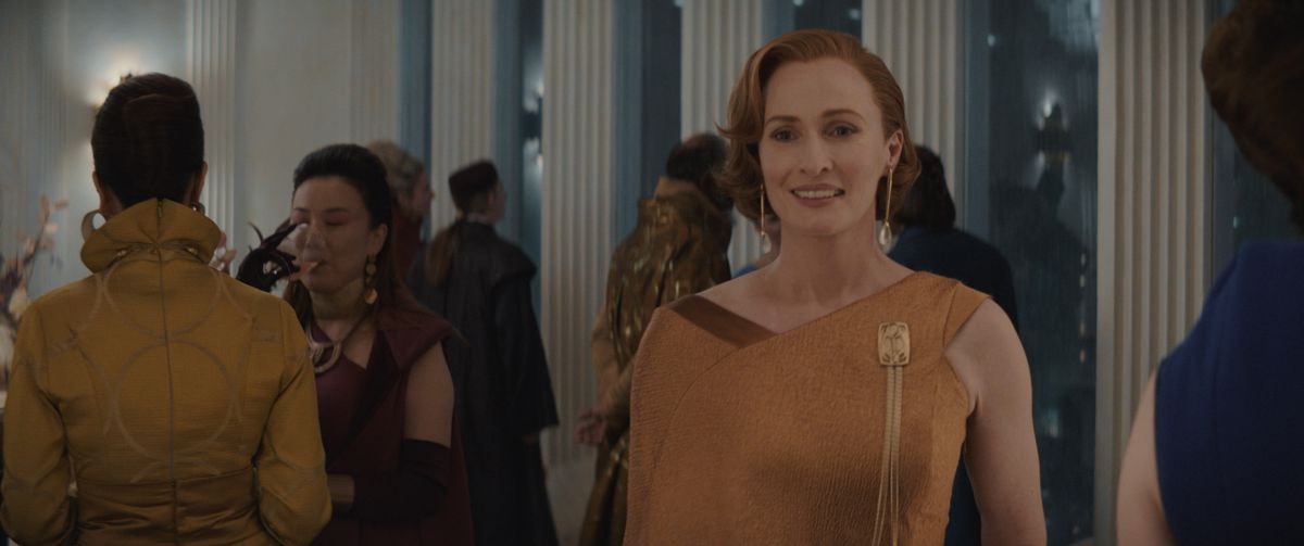 Mon Mothma awkwardly smiling at a dinner party