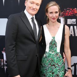 Host Conan O'Brian with his wife, Liza Powel.