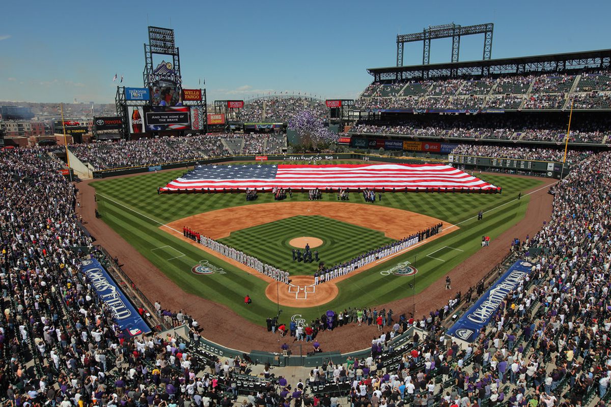 DENVER, CO - APRIL 01:  The National Anthem is observed prior to the game as the Colorado Rockies host the Arizona Diamondbacks during Opening Day at Coors Field on April 1, 2011 in Denver, Colorado.  (Photo by Doug Pensinger/Getty Images)