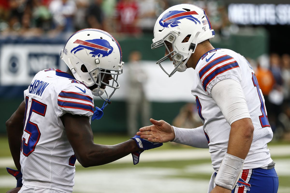 John Brown of the Buffalo Bills celebrates a touchdown with Josh Allen against the New York Jets at MetLife Stadium on September 8, 2019 in East Rutherford, New Jersey.