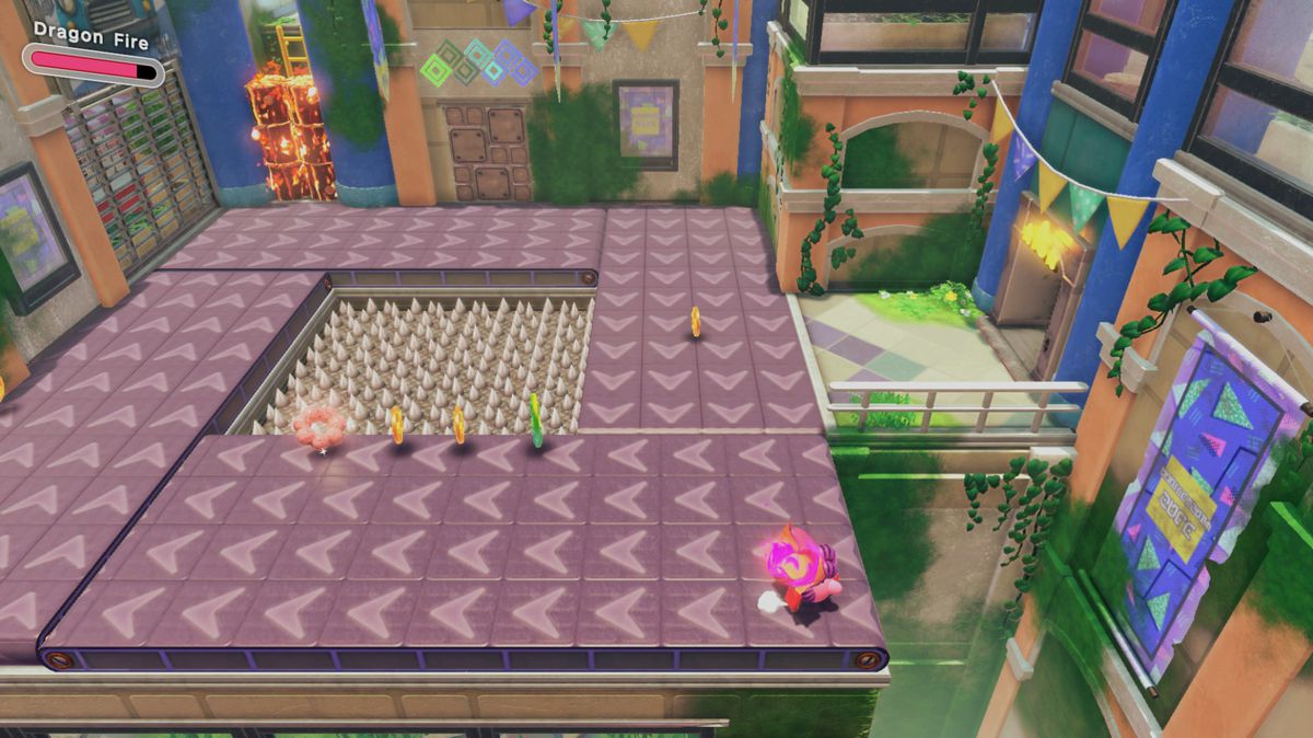Kirby stands on a conveyor belt while doughnuts and coins float around it