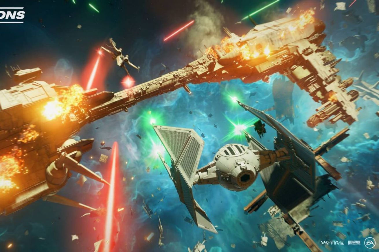 A TIE fighter surrounded by lasers and explosions.