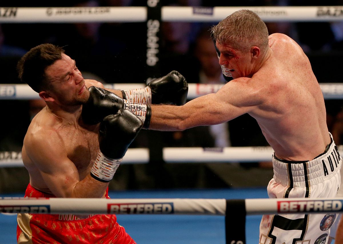 Liam Smith (right) lands a left hook on Anthony Fowler (left).