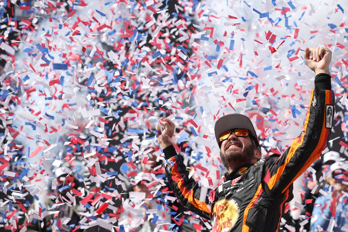 Martin Truex Jr., driver of the #19 Bass Pro Shops Toyota, celebrates in victory lane after winning the NASCAR Cup Series Würth 400 at Dover International Speedway on May 01, 2023 in Dover, Delaware.