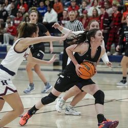 Riverton's Abigail McDougal (10) drives into the basket during a high school girls basketball game at Herriman High School in Herriman on Thursday, Jan.  27, 2022.