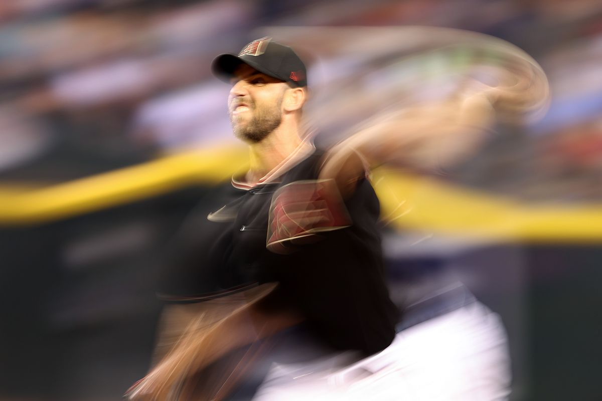 A long exposure shot of Madison Bumgarner throwing a pitch, with the streaky motion that such a shot features. Honestly, looks a lot like the fever dream Hazen must have had when he decided this signing was a good idea