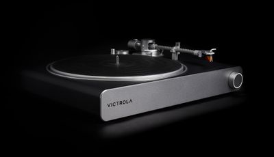 An image of Victrola’s Stream Carbon turntable with a black background.