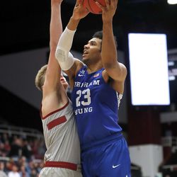 BYU forward Yoeli Childs (23) shoots as Stanford forward Michael Humphrey defends during the second half of an NCAA college basketball game in the first round of the NIT on Wednesday, March 14, 2018, in Stanford, Calif. (AP Photo/Tony Avelar)