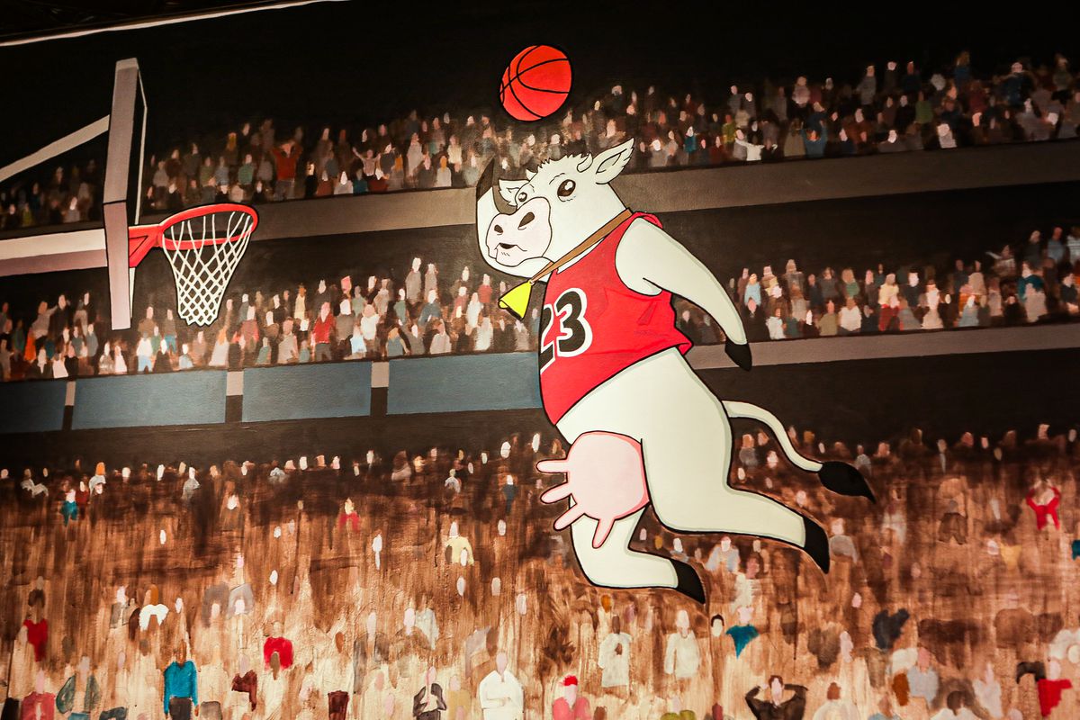 A painting of a cow dunking a basketball wearing an MJ jersey.