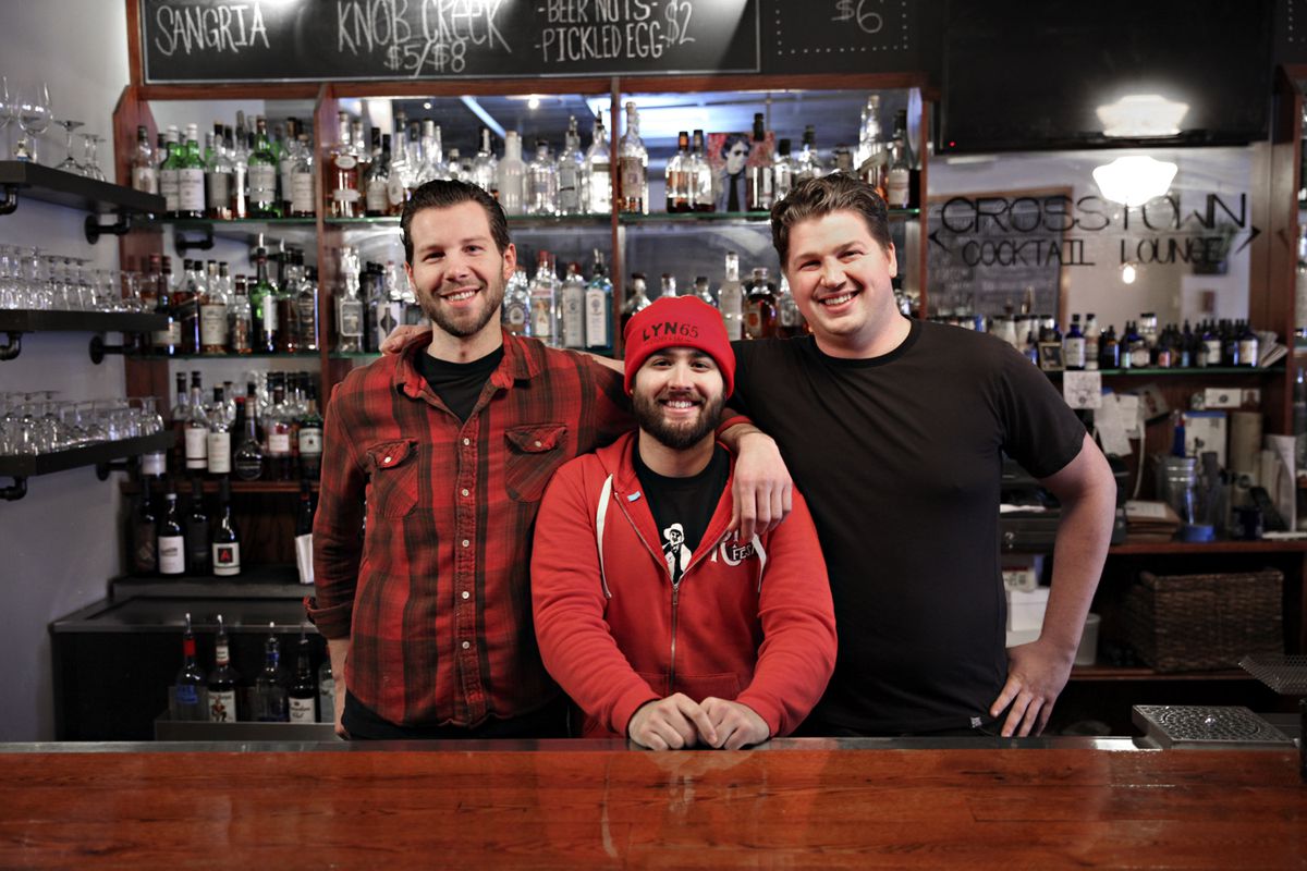 Travis Serbus, Tye Sullivan and Jason Sawicki behind the Lyn 65 bar. Photo by Katie Cannon