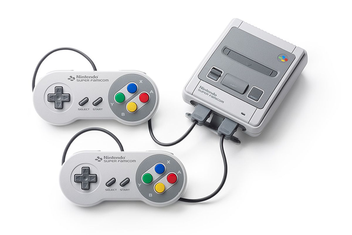 Photo of the Nintendo Classic Mini Super Famicom console with two controllers