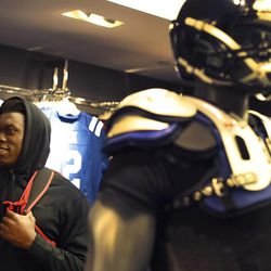 Ziggy Ansah, defensive end from Brigham Young University, shops at Niketown the day before the 2013 NFL Draft, April 24 in New York City.
