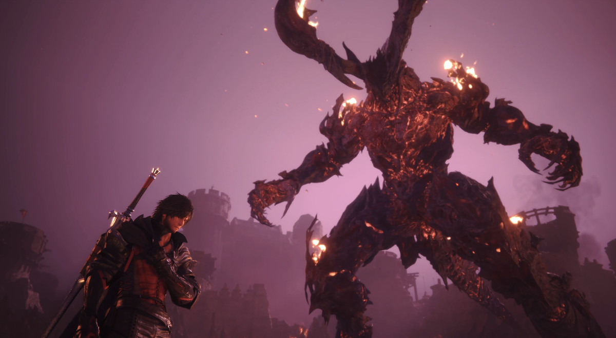Clive reaches for his sword at the feet of a towering lava giant, which also has horns, in Final Fantasy 16