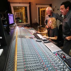 Gaynor Brunson, chief engineer and owner of Rock Canyon Studios in Provo, works with brothers Merrill Osmond, left, and Jay Osmond, right, on a record on Tuesday, June 26, 2018.