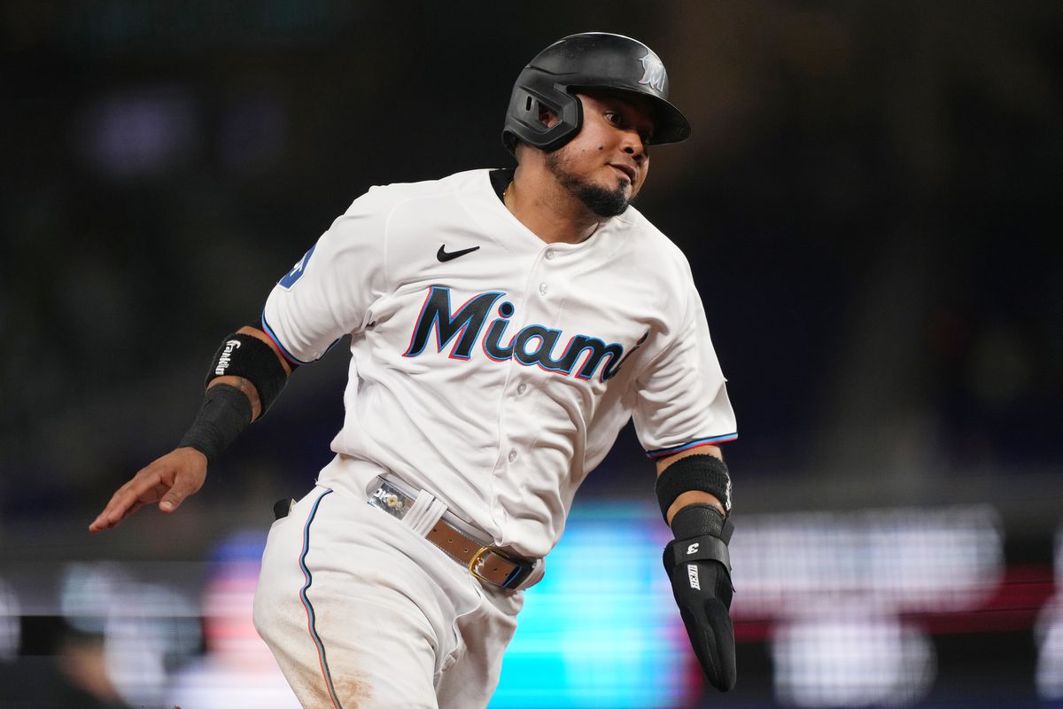 Luis Arraez of the Miami Marlins rounds third base to score a run against the Kansas City Royals at loanDepot park on June 6, 2023 in Miami, Florida.