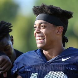 Squally Canada, left, and Micah Simon joke around after football practice at BYU in Provo on Monday, July 31, 2017.