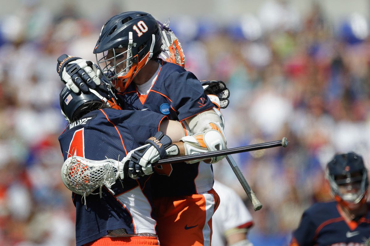 BALTIMORE, MD - MAY 28: Chris Bocklet #10 of the Virginia Cavaliers celebrates his first half goal against the Denver Pioneers with teammate Matt White #4   at M&T Bank Stadium on May 28, 2011 in Baltimore, Maryland.  (Photo by Rob Carr/Getty Images)