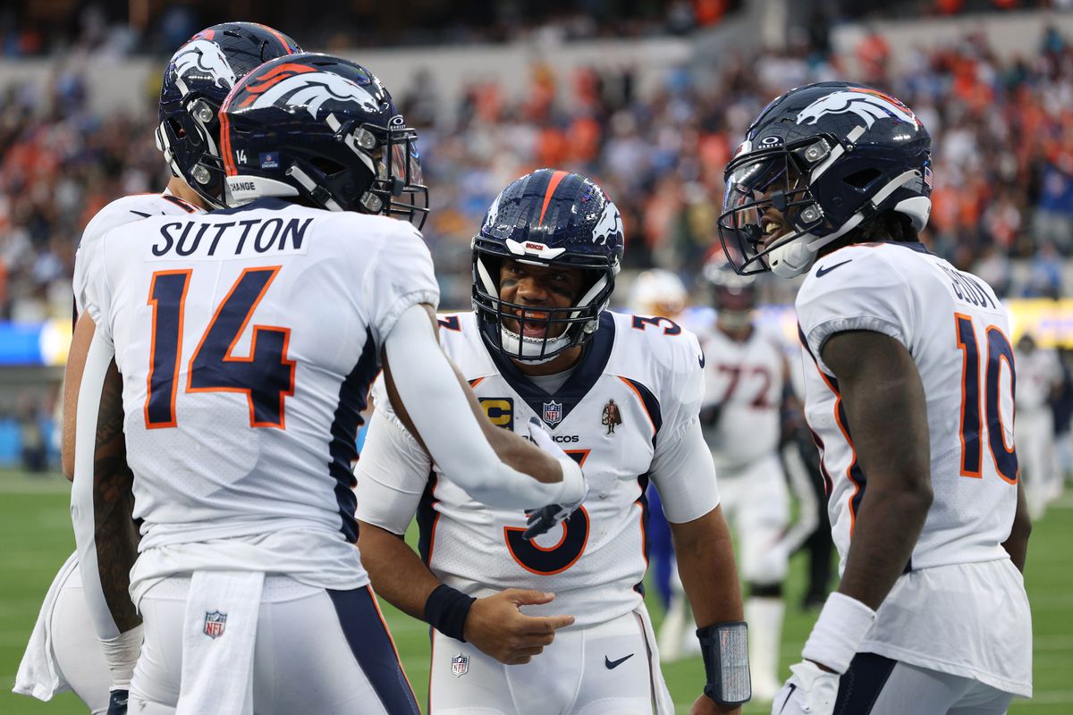 Russell Wilson #3 of the Denver Broncos celebrates his touchdown pass to Courtland Sutton #14 with Jerry Jeudy #10, for a 17-0 laed, during a 24-7 win over the Los Angeles Chargers at SoFi Stadium on December 10, 2023 in Inglewood, California.