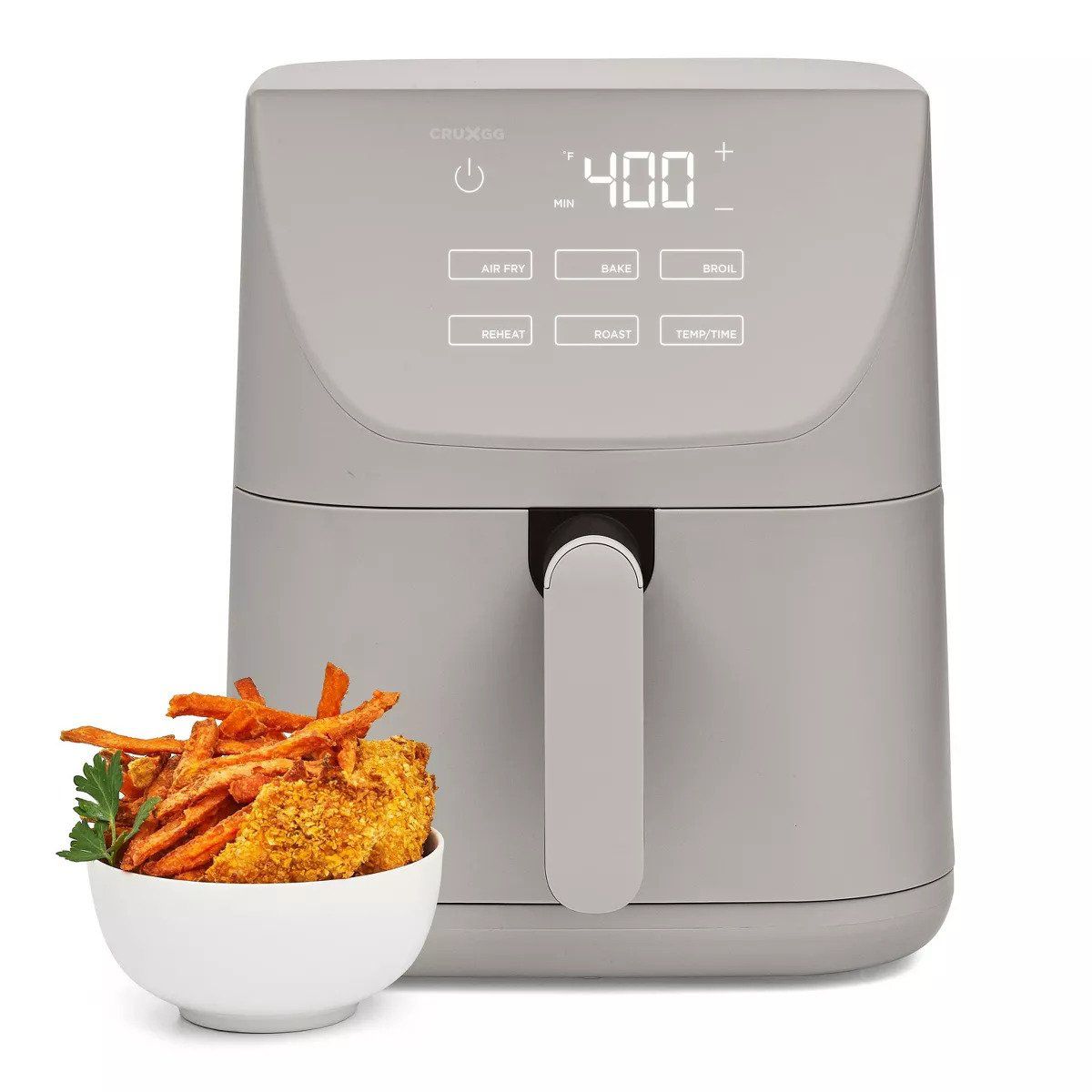 A gray air fryer alongside a bowl of sweet potato fries.