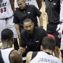 Miami Heat assistant coach Juwan Howard talks to players during the second half of an NBA summer league basketball game against the New Orleans Pelicans, Wednesday, July 13, 2016, in Las Vegas. (AP Photo/John Locher)