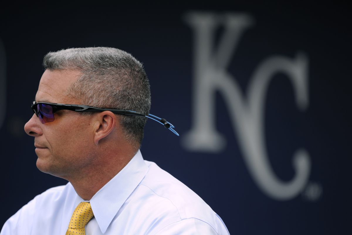 Dayton Moore, general manager of the Kansas City Royals, watches as the Royals take batting practice prior to a game against the Detroit Tigers on May 1, 2015 at Kauffman Stadium in Kansas City, Missouri.