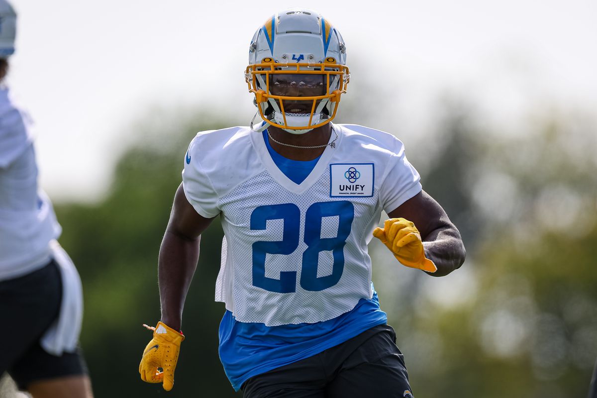 Isaiah Spiller #28 of the Los Angeles Chargers participates in a drill during training camp at Jack Hammett Sports Complex on July 27, 2022 in Costa Mesa, California.