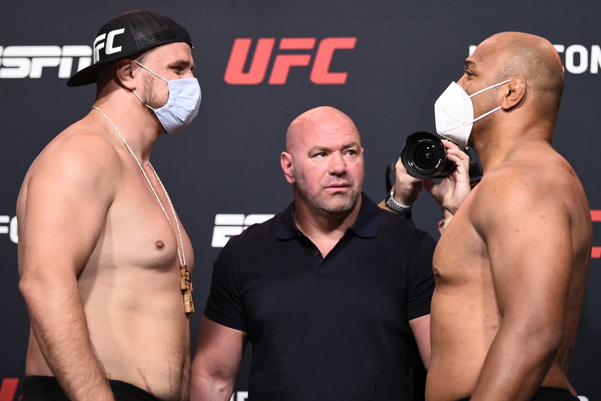 Opponents Alexandr Romanov of Moldova and Marcos Rogerio De Lima of Brazil face off during the UFC Fight Night weigh-in at UFC APEX on September 04, 2020 in Las Vegas, Nevada.