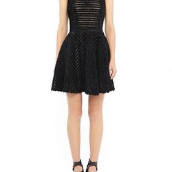 <a href="http://www.nicolemiller.com/DISTRESSED_RUFFLE_DRESS/pd/c/307/np/307/p/3363.html">Distressed ruffle dress</a>, $80 (Was $455)