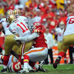 Sep 26, 2010; Kansas City, MO, USA; San Francisco 49ers quarterback Alex Smith (11) is sacked by Kansas City Chiefs linebacker Tamba Hali (91) in the second half at Arrowhead Stadium. The Chiefs won 31-10
