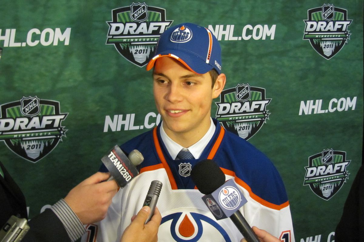 Dillon Simpson with his million dollar smile addresses the media as one of their newest Oilers' prospects. Photo by Lisa McRitchie all rights reserved