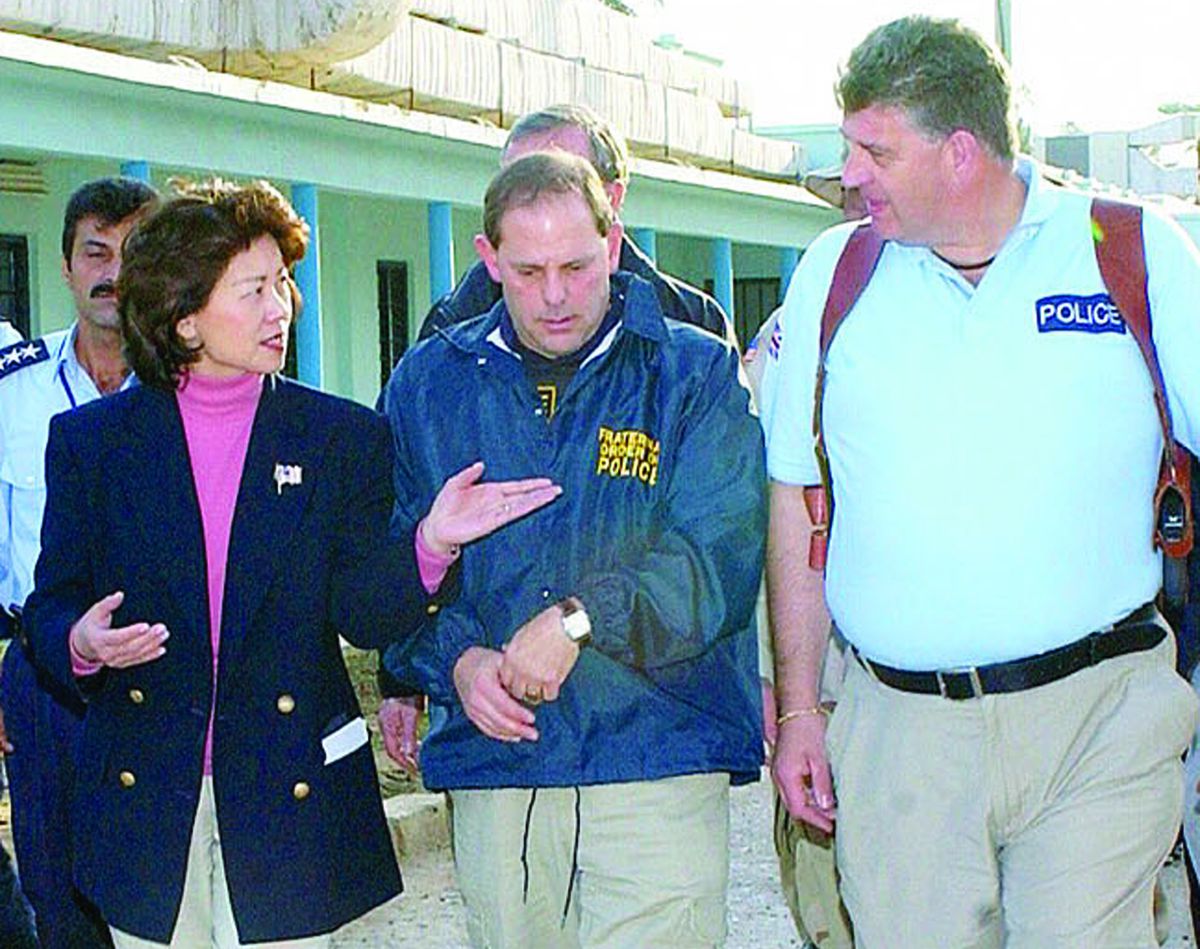 Chuck Canterbury, national president of the Fraternal Order of Police (center) during a 2005 tour of the Baghdad (Iraq) Police Academy. With him was Elaine Chao (left), then the U.S. Secretary of Labor. 