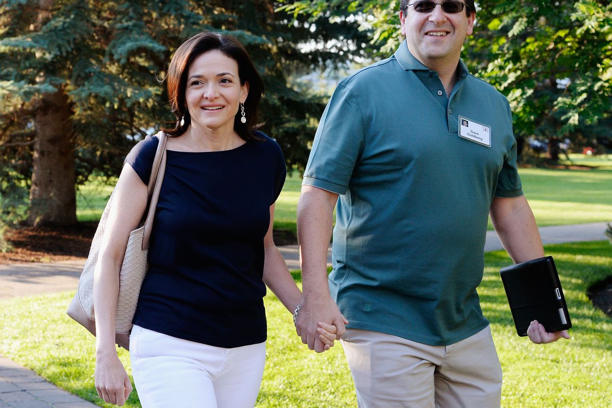 Sheryl Sandberg with her husband in 2013.