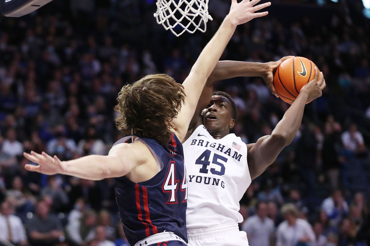 BYU center Fousseyni Traore drives on Saint Mary’s Gaels guard Alex Ducas in Provo on Saturday, Jan. 8, 2022.