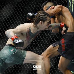 Sean O’Malley lands a punch at UFC 222.
