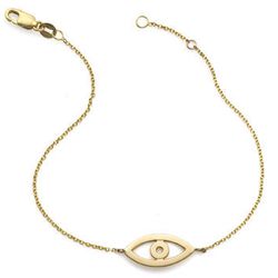 <b>Sarah Chloe</b> Evil Eye Bracelet in 14K Gold, <a href="http://www.sarahchloe.com/shop/shop-by-category/bracelets/charming-bracelets-evil-eye.html">$298</a> at Montmarte