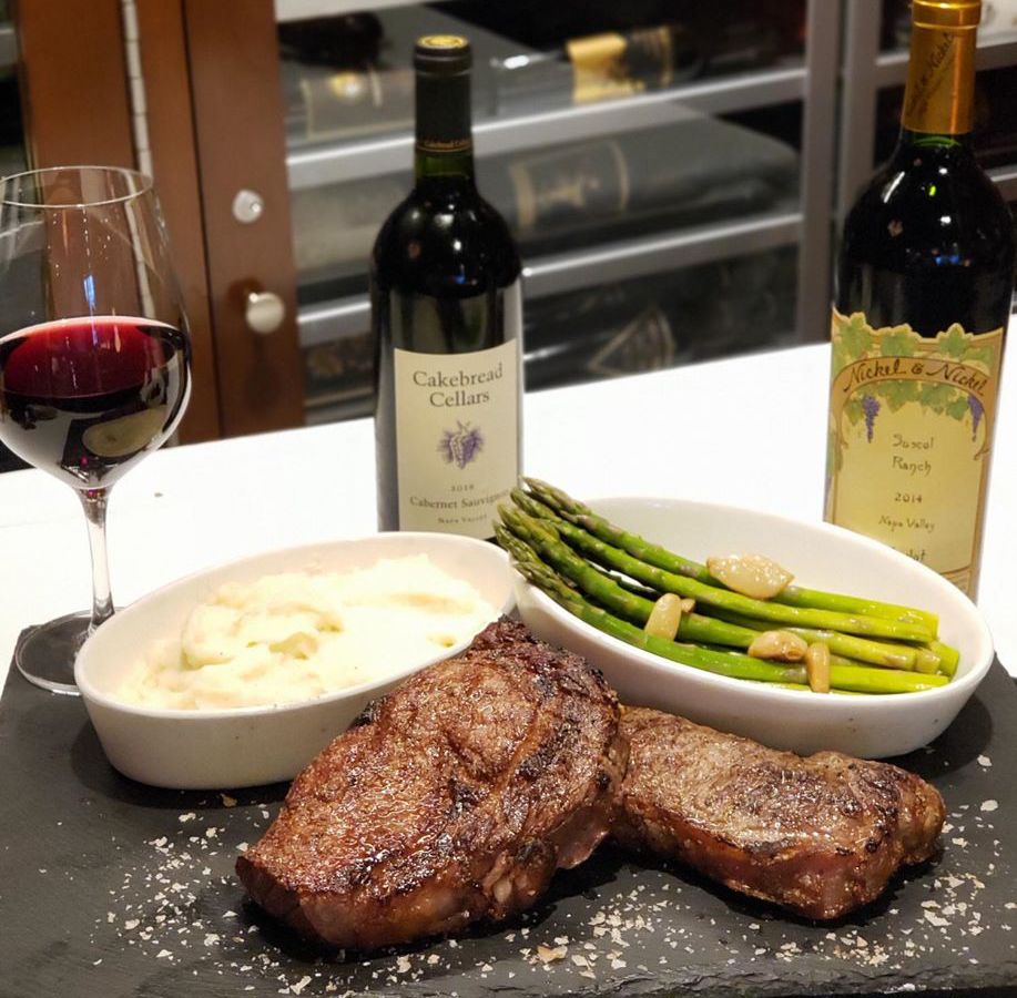 Steak, classic sides and also bottles of wine, all still on the pickup menu at The Palm