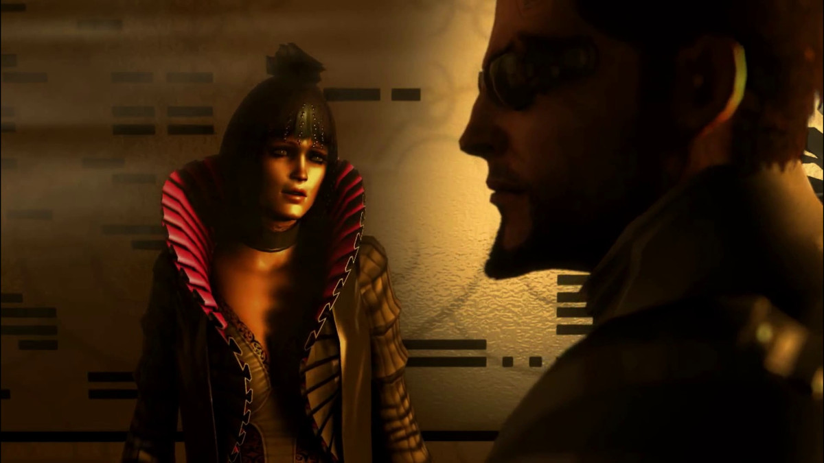 Eliza Cassan (left) looking morose in her red-lined Elizabethan ruff and all-black apparel otherwise, with Adam Jensen in the foreground turning away from her
