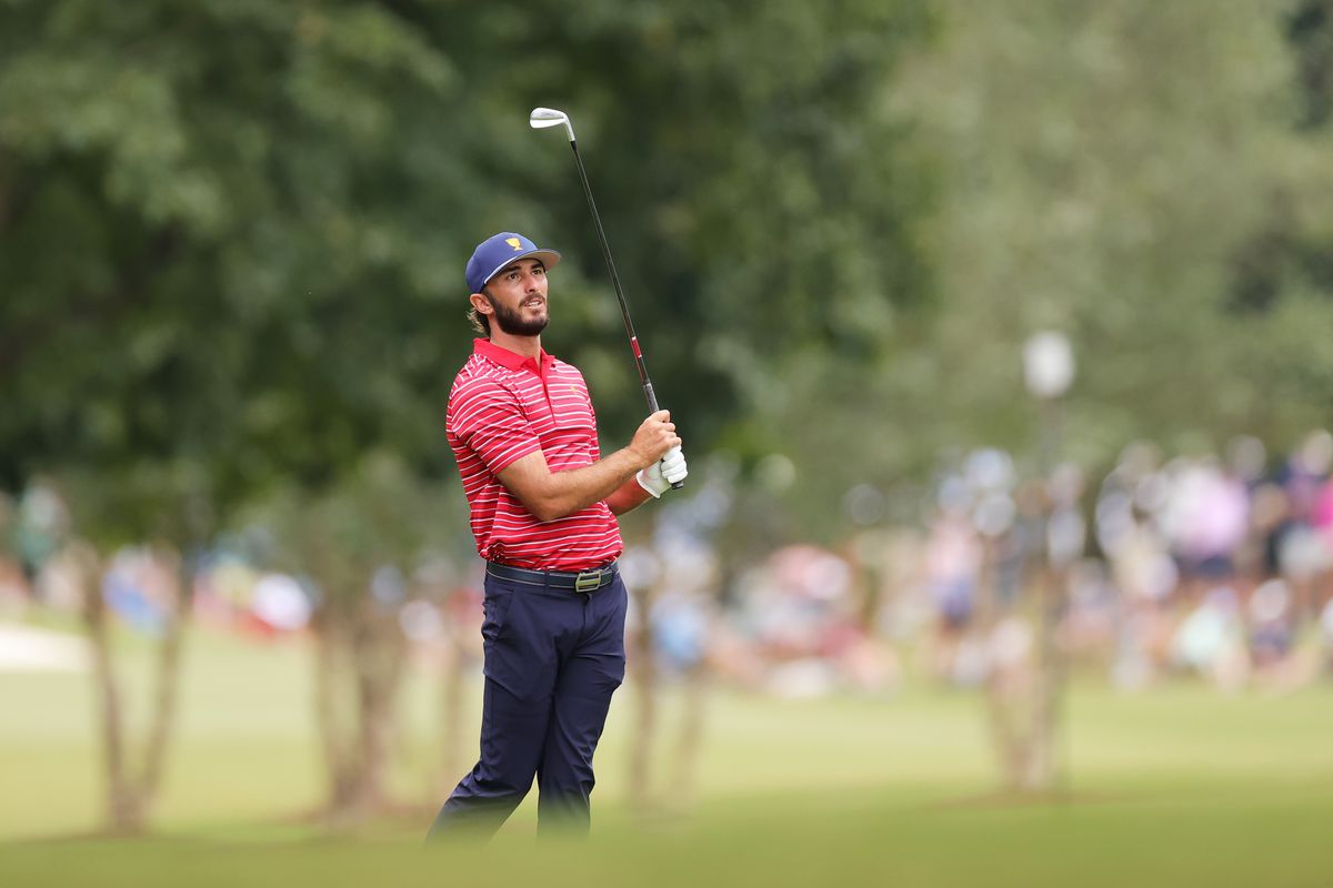 Max Homa of the United States Team plays a second shot on the second hole during Sunday singles matches on day four of the 2022 Presidents Cup at Quail Hollow Country Club on September 25, 2022 in Charlotte, North Carolina.