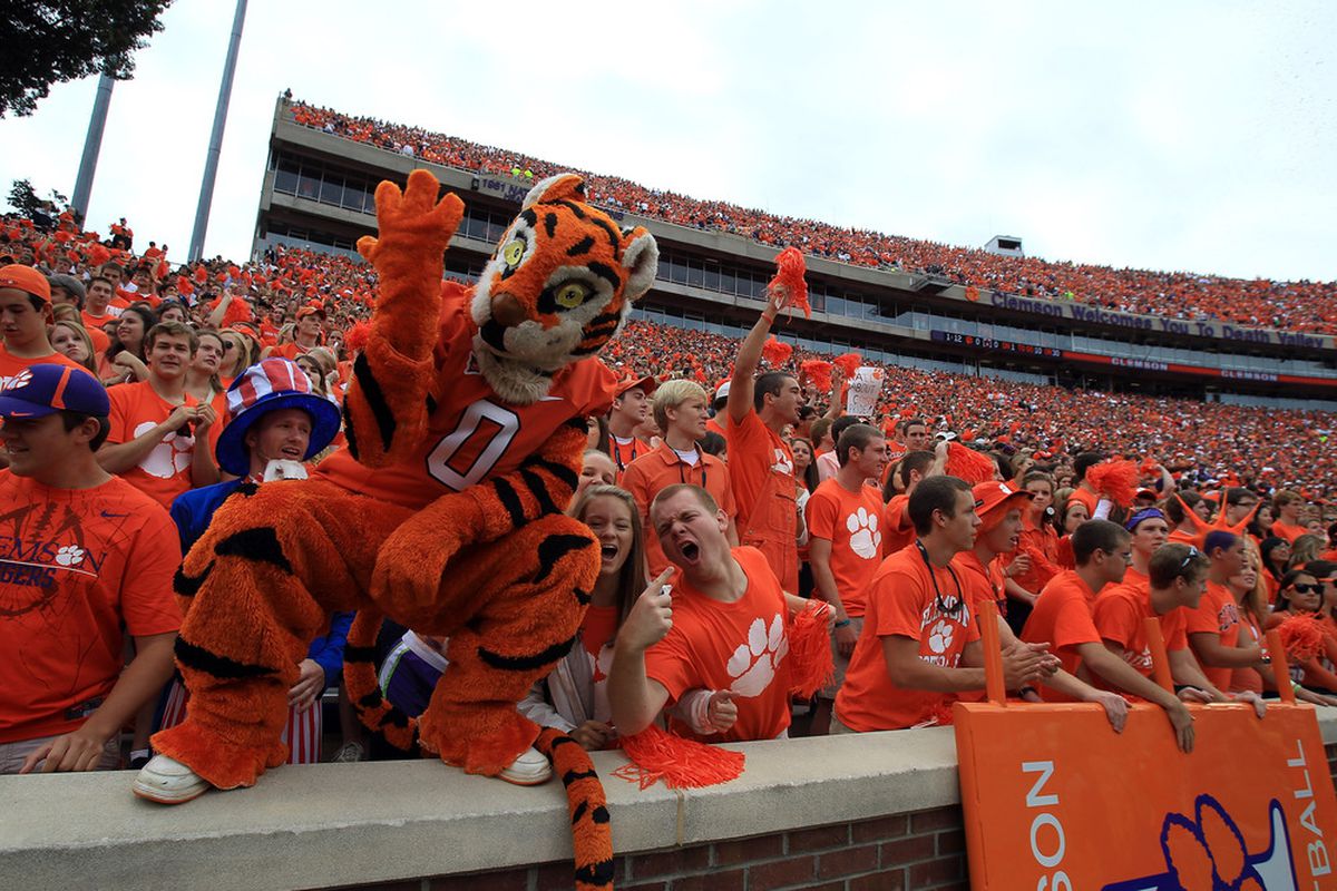 CLEMSON, SC - SEPTEMBER 17:  Fans of the Clemson Tigers cheer on their team against the Auburn Tigers at Memorial Stadium on September 17, 2011 in Clemson, South Carolina.  (Photo by Streeter Lecka/Getty Images)