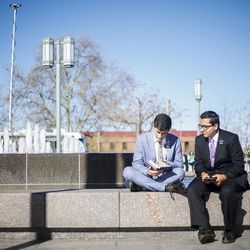 Two missionaries study outside the Conference Center before the morning session of the LDS Church’s 187th Annual General Conference in Salt Lake City on Saturday, April 1, 2017.