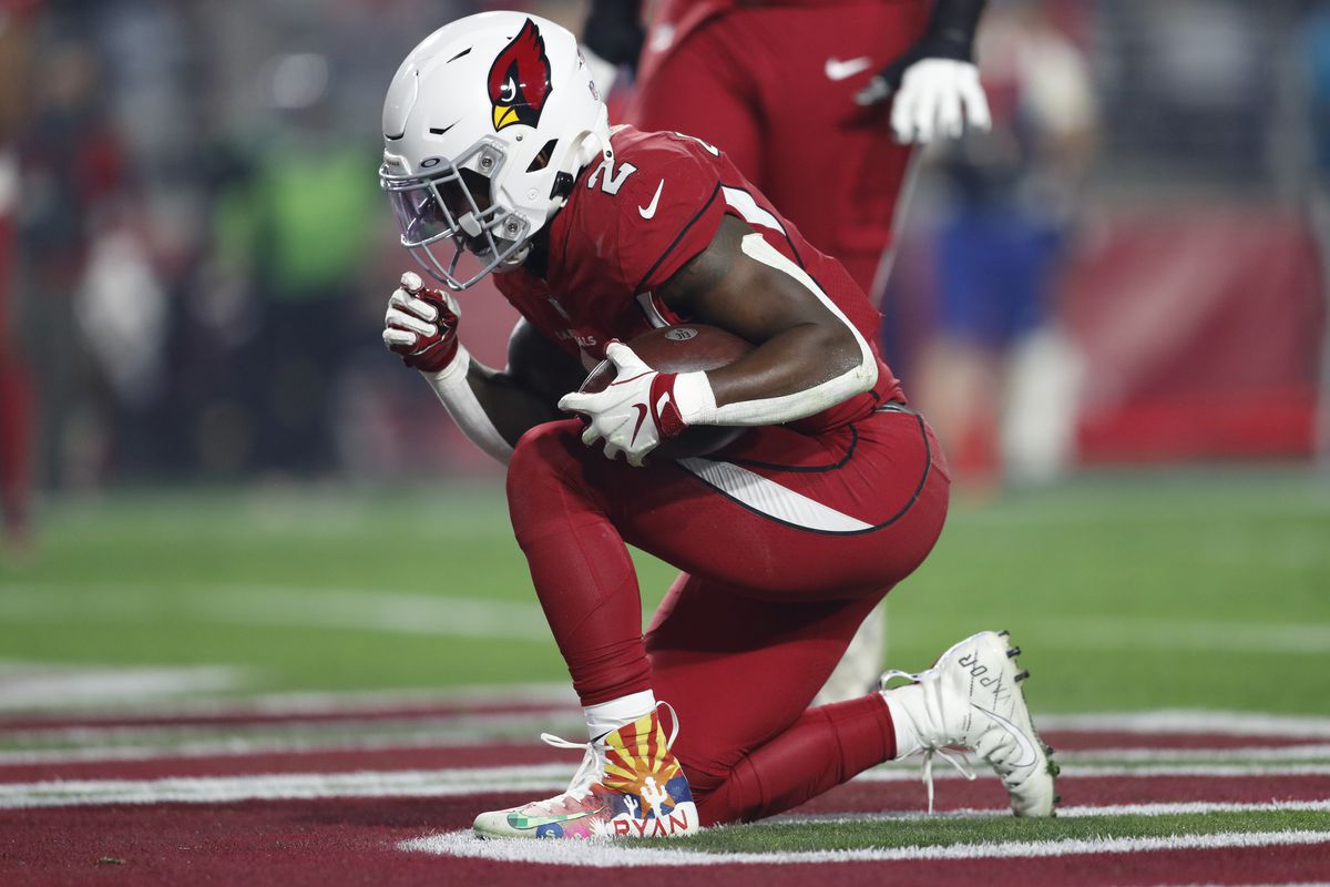 Running back Chase Edmonds #2 of the Arizona Cardinals reacts after scoring a touchdown during the first half of the game against the Indianapolis Colts at State Farm Stadium on December 25, 2021 in Glendale, Arizona. The Colts beat the Cardinals 22-16.