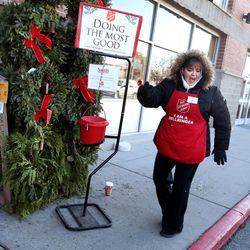 Angela Wilkins, an employee in Smith's floral department, sings and dances while manning the kettle for the Salvation Army at a Smith's in Salt Lake City on Friday, Dec. 2, 2016. The Salvation Army is seeking volunteer bell ringers for the holiday season, and Smith's employees stepped up Friday, providing over 1,000 man hours standing at the kettles, which will save the Salvation Army roughly $9,000 in staffing costs. The Salvation Army is asking corporations, churches and families to volunteer and help differ the staffing costs and increase donations.