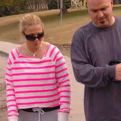 Cari Kinder walks her dog with her fiance in Sugarhouse Park in February, 2016. Kinder began taking opioids nine years ago to treat chronic pain from multiple sclerosis and fibromyalgia. She said she can't function without pain medication. She got hooked. Soon, her life was out of control.