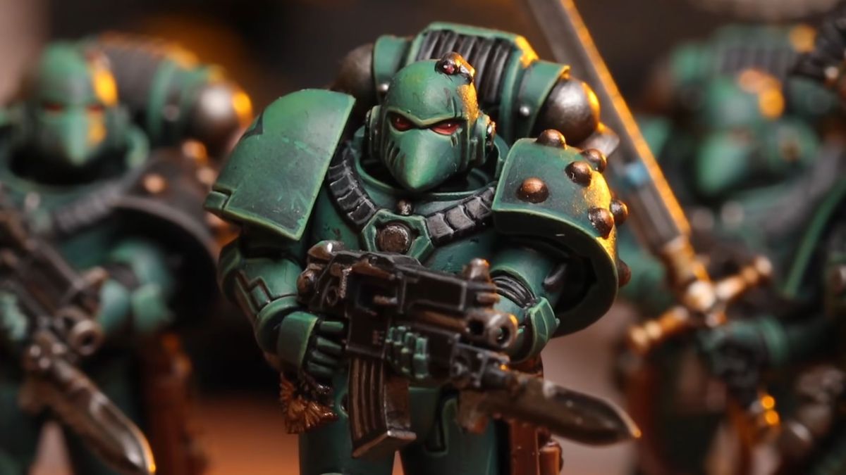 A blue-armored “beakie” style Space Marine from the Horus Heresy Age of Darkness boxed set.