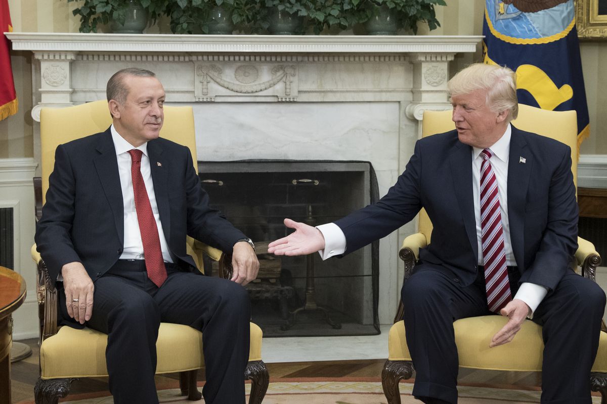 President Donald Trump extends his hand for a handshake with President of Turkey Recep Tayyip Erdogan , in the Oval Office of the White House on May 16, 2017 in Washington, DC.&nbsp;